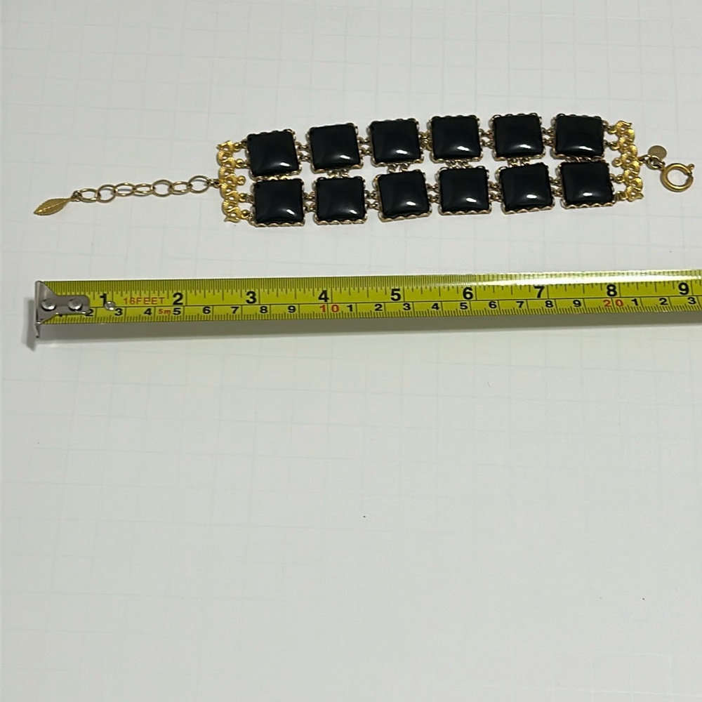 VINTAGE DAVID AUBREY. GOLDTONE BRACE